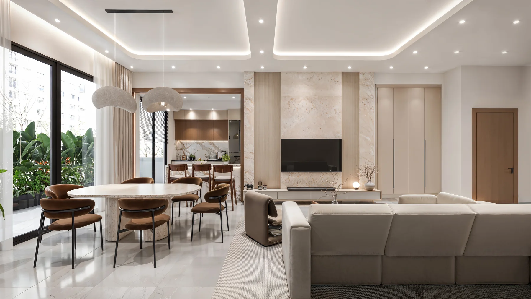 Contemporary living and dining spaces at Élan Estate, within Le Rêve